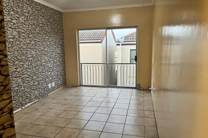 For Sale: 2-Bedroom Apartment in Parklands East, near transport and shopping.