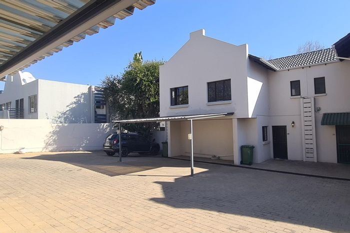 For Sale: 2-Bedroom Townhouse in Sandown with pool, parking, and security features.