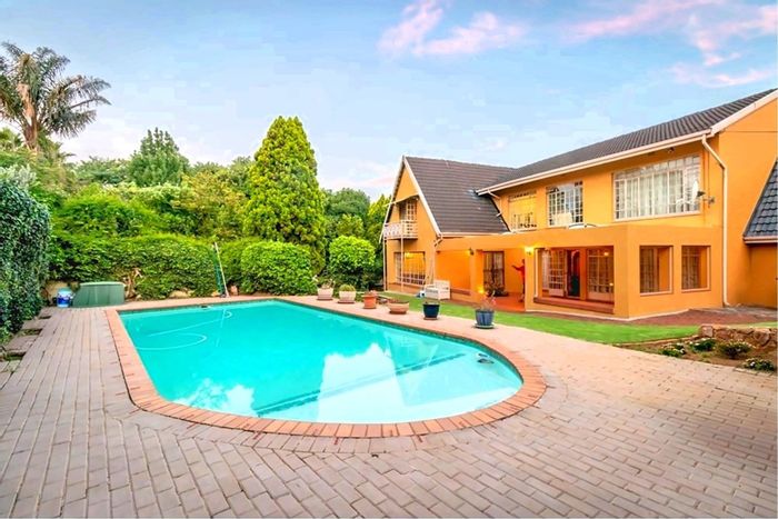 For Sale: House in Constantia Kloof with pool, koi pond, and staff quarters.