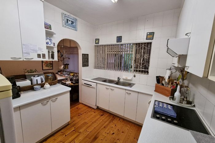 For Sale: 3-Bedroom Apartment in Pelham with Veranda, Garages, and Rental Potential.