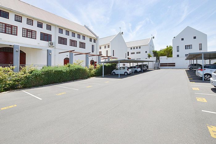 For Sale: Apartment in De Werf with pool, braai area, and secure parking.