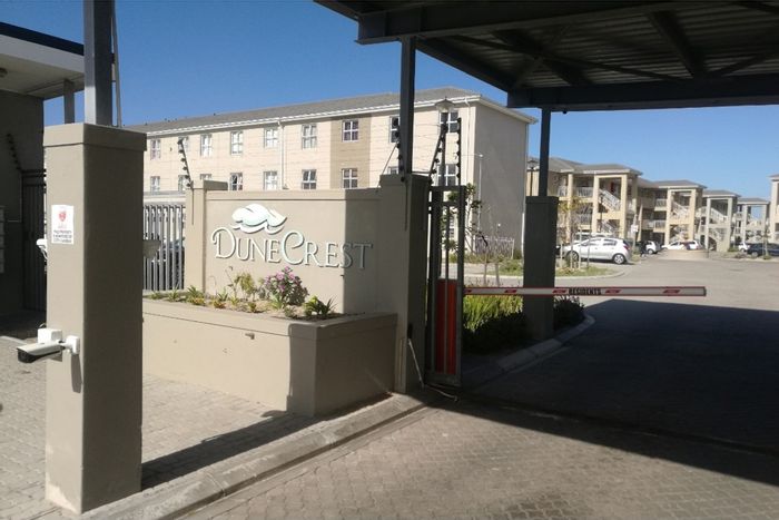 For Sale: 2-bedroom apartment in Muizenberg Central with pool and beach access.