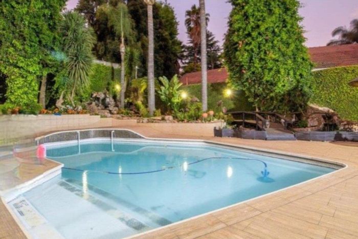 For Sale: Spacious Morning Hill house with pool, entertainment areas, and gourmet kitchen.