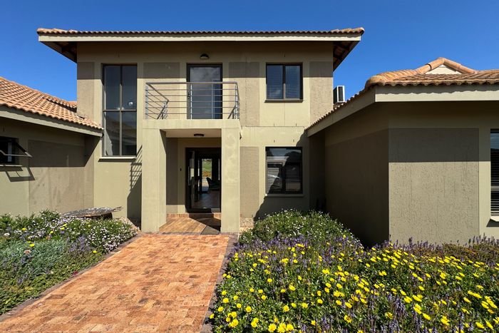 For Sale: House in Langebaan Country Estate with golf course views and amenities.