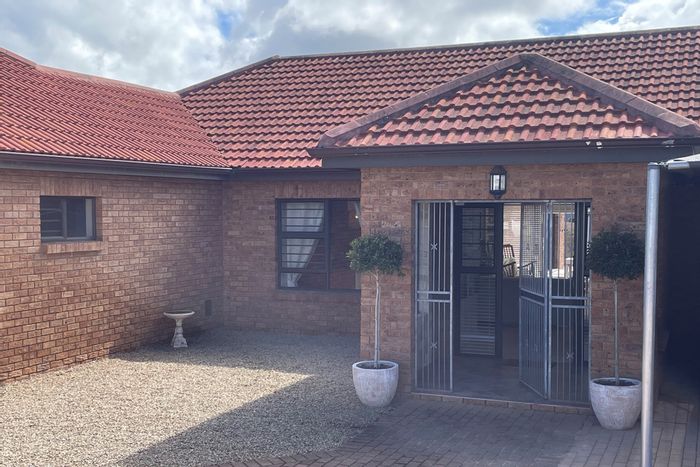 Eco-friendly 4-Bedroom House for Sale in Myburgh Park with ample parking.