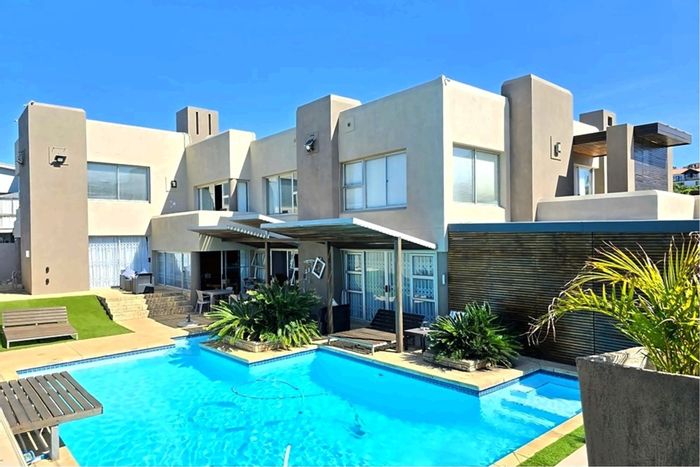 For Sale: Beachfront House in Jeffreys Bay Central with pool, flat, and secure parking.