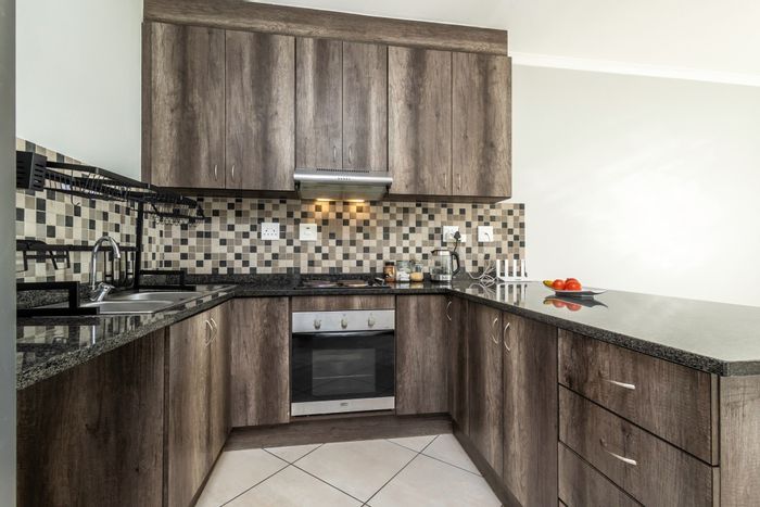 Buh Rein Estate Apartment For Sale: Two bedrooms, braai area, secure parking.