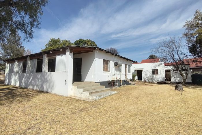 House for Sale in Parys Central: Pilates studio, open-plan living, cottage, and outbuilding.