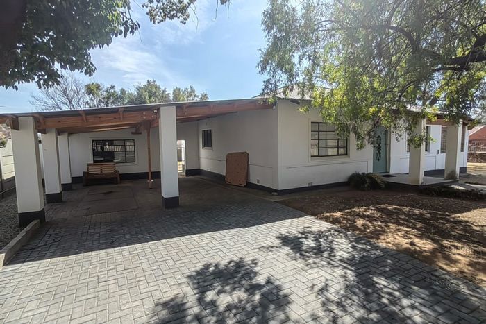 House for Sale in Parys Central: Pilates studio, open-plan living, cottage, and outbuilding.