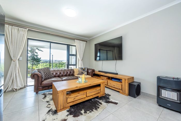 For Sale: Apartment in Protea Heights with balcony, braai, parking, and playground.