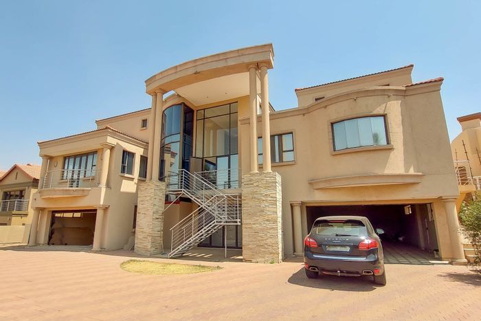 For Sale: House in Blue Valley Golf Estate with five en-suite bedrooms, cinema, and gym.