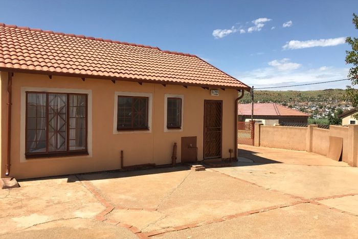 House for Sale in Mamelodi East: 3 Bedrooms, spacious lot, ample parking.