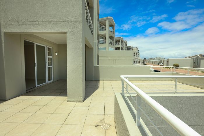 Big Bay Apartment For Sale: 2 beds, patio, parking, near beach and amenities.