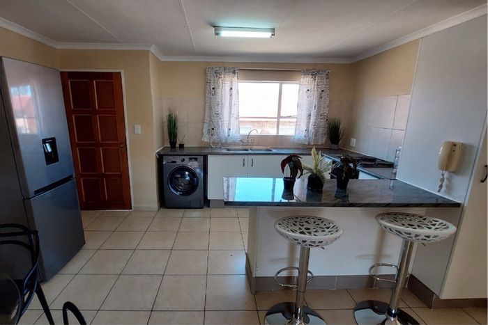 For Sale: Townhouse in Liefde En Vrede with pool, security, and covered parking.