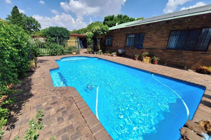 Spacious family home in Sasolburg Central with pool, garage, and security features. For Sale.