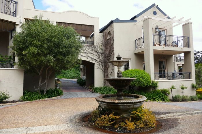 Franschhoek Central Apartment For Sale: Ground-floor villa with pool, security, and rental potential.