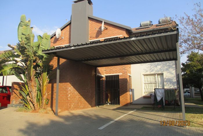 For Sale: Terenure Townhouse with playground, braai pit, and covered parking.