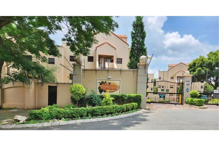 For Sale: Townhouse in Paulshof with clubhouse, pool, tennis court, and security.