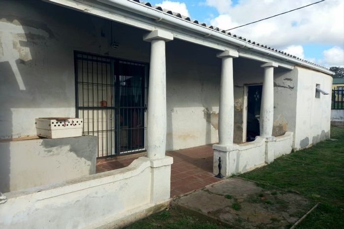 For Sale: House in Albertinia Central with 3 beds, double garage, and storage.