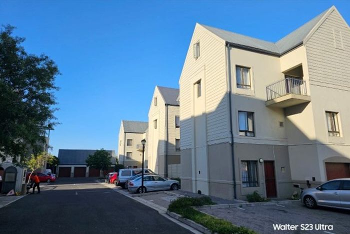 For Sale: Apartment in Parklands with 3 beds, 2 baths, parking, and rental income.