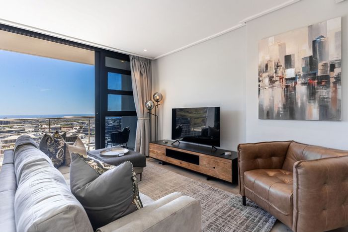 For Sale: Cape Town City Centre Apartment with pool, parking, and high rental income.