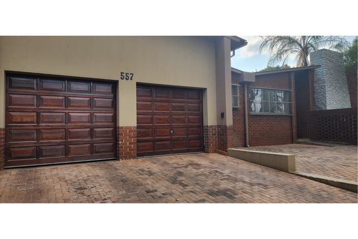 For Sale: Spacious 4-bedroom house with garden, braai pit, and ample parking in Pretoria North.