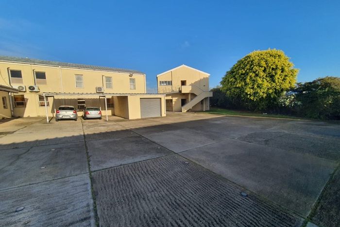 Neave Industrial: Versatile commercial space for sale with ample parking and flexible layout.