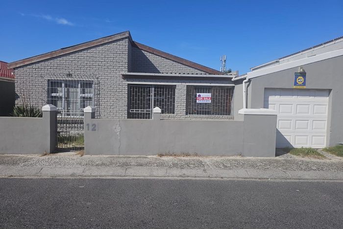 For Sale: House in Strandfontein Village with garage, fiber internet, near beaches.