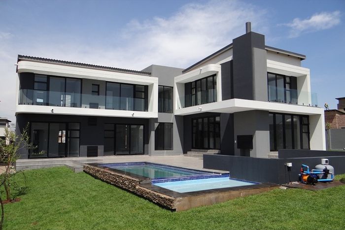 For Sale: House in Midstream Heights with 4 beds, pool, study, and entertainment area.