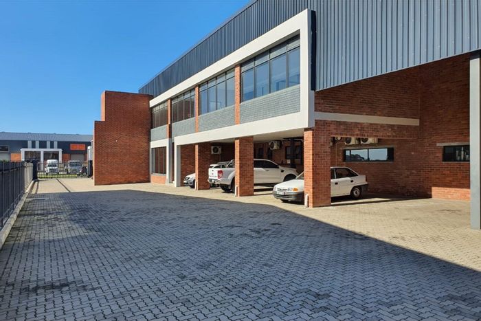 For Sale: Industrial property in Fairview with 900m2, office space, and backup generator.