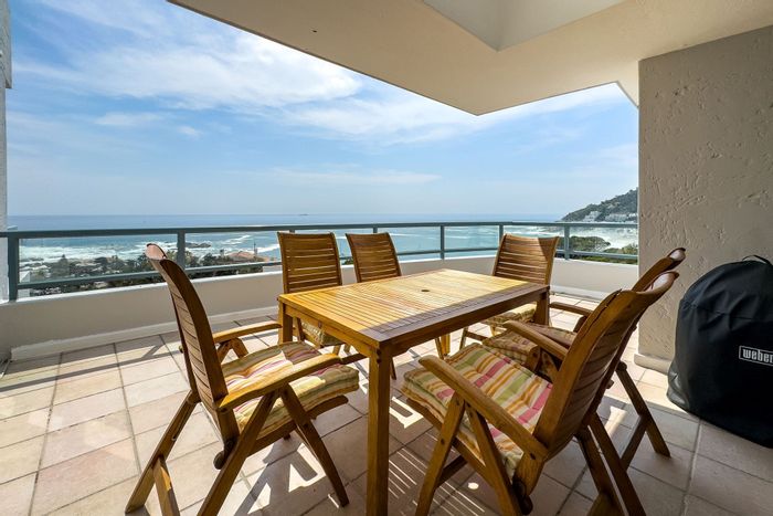 Clifton Apartment For Sale: Sea views, two balconies, parking, and scullery.