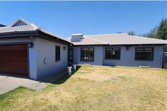 Loft-style 3-bedroom house in Helderwyk with pool, braai area, and security. For Sale.