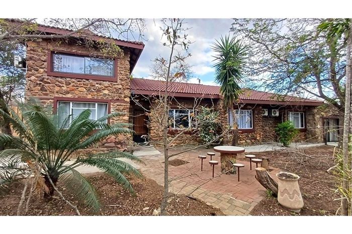 House for Sale in Marloth Park Central: Five bedrooms, wildlife views, historic charm.