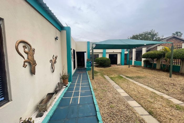 4-Bedroom House For Sale in West Acres Ext 13 with backyard, parking, and investment potential.