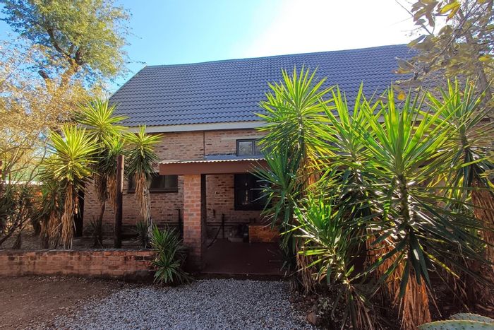 Spacious 5-bedroom house with flat, secure location in Marloth Park Central, For Sale.