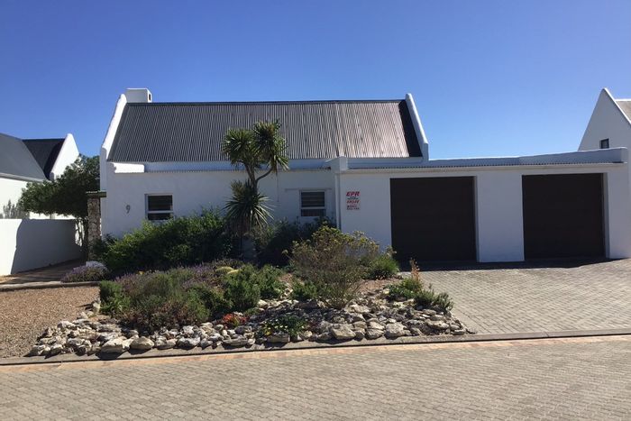 Jacobsbaai House For Sale: Main house, flat, double garage, eco-friendly features.