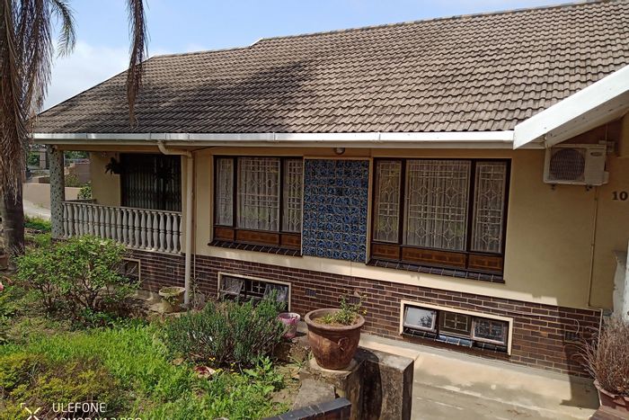 House for Sale in Lotusville: 3 Bedrooms, basement tenants, ample parking, ready to personalize.