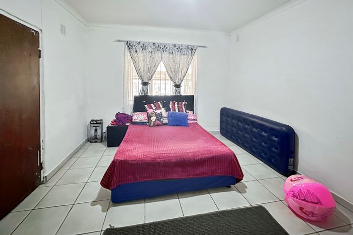 3 Bed, 2 Bath House in Northdale For Sale with spacious kitchen and parking.