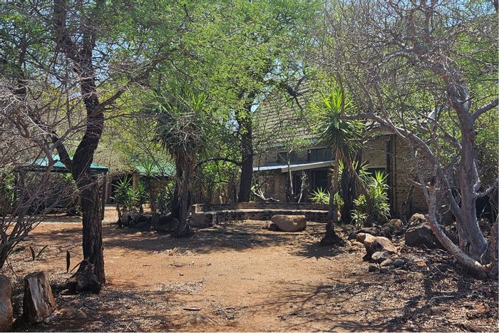 House for Sale in Marloth Park Central: Spacious living, 2-bedrooms, rental apartment, outdoor entertainment.