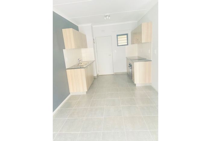 To Rent: 2-Bedroom Apartment in Athlone Park with secure parking and prepaid utilities.