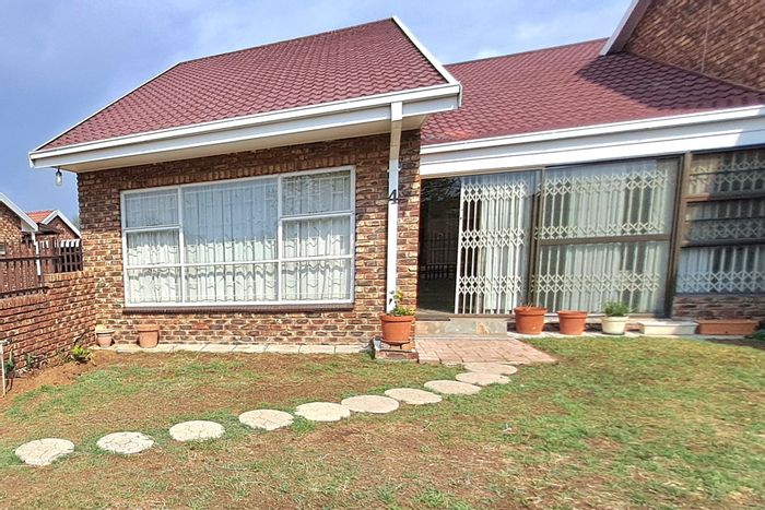 Townhouse for Sale in Parys Central: Two bedrooms, open-plan living, covered patio.