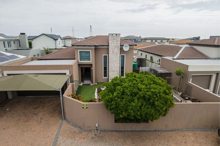 For Sale: House in Parklands North with braai room, scullery, and eco-friendly features.