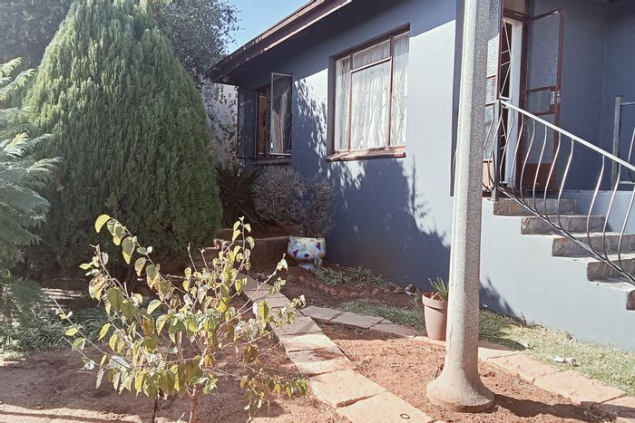 House for Sale in Sophiatown: Four bedrooms, pajama lounge, potential cottage, approved plans.