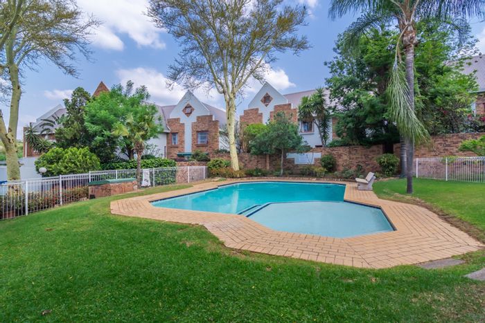 Witkoppen Townhouse For Sale: Open plan living, private garden, attic potential, communal pool.