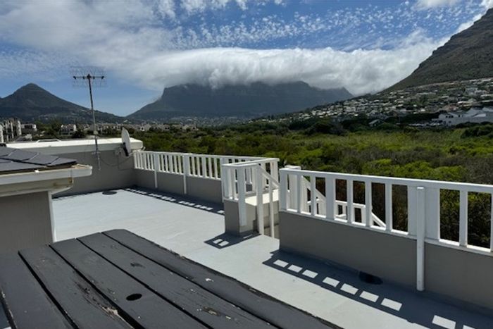 Hout Bay Central House For Sale: Beach access, panoramic views, security estate amenities.