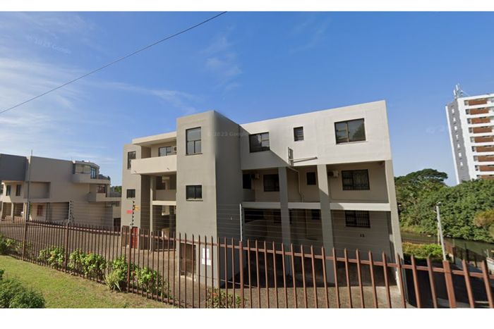For Sale: Apartment in Margate Central with lagoon views, 3 beds, secure parking.