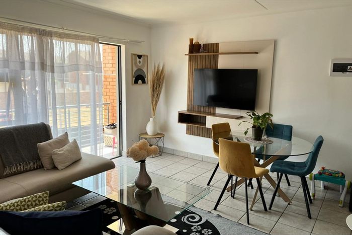 2-Bedroom Apartment For Sale in Sagewood with Pool, Clubhouse, and Carport.