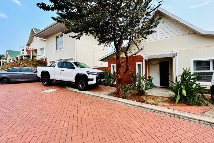 For Sale: 4-bedroom townhouse in Kindlewood Estate with garden, garage, and security.