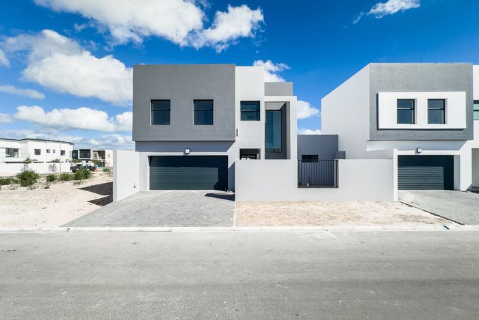 For Sale: 4-Bedroom House in Sandown with garden, braai pit, and security system.