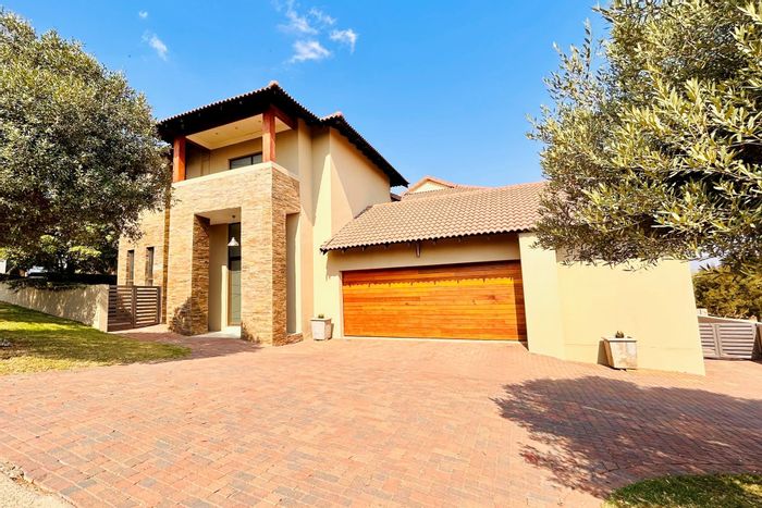 4-Bedroom House For Sale in Waterkloof Golf Estate with pool, garden, and security.